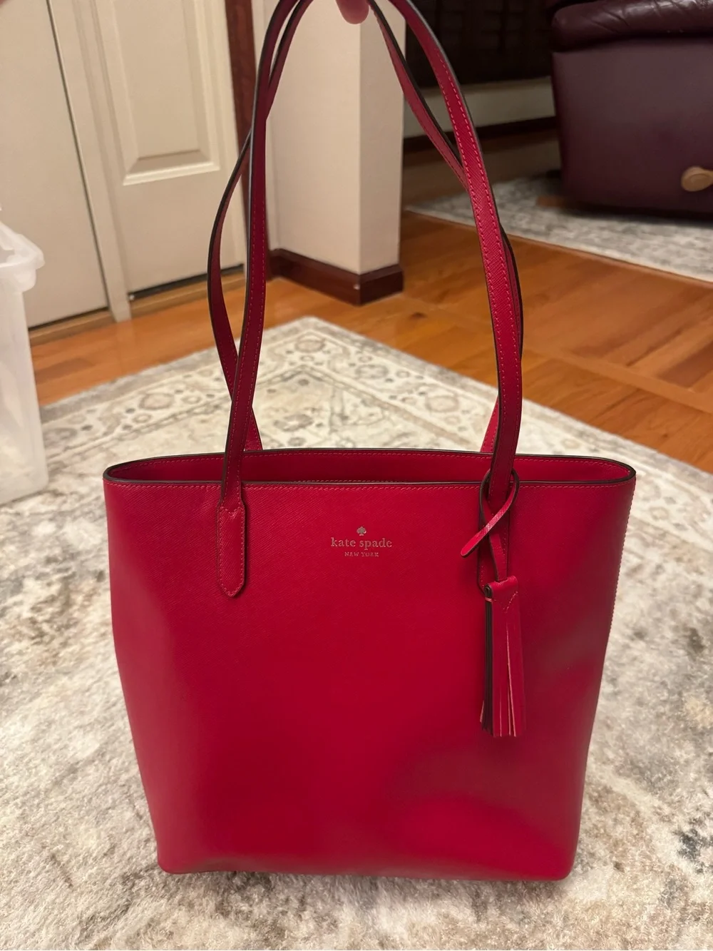 kate spade red saffiano leather tote with tassel